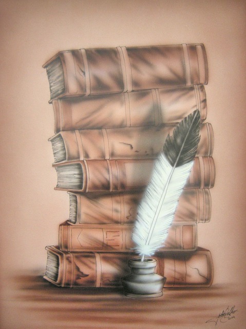 Stack of books behind quill in ink pot